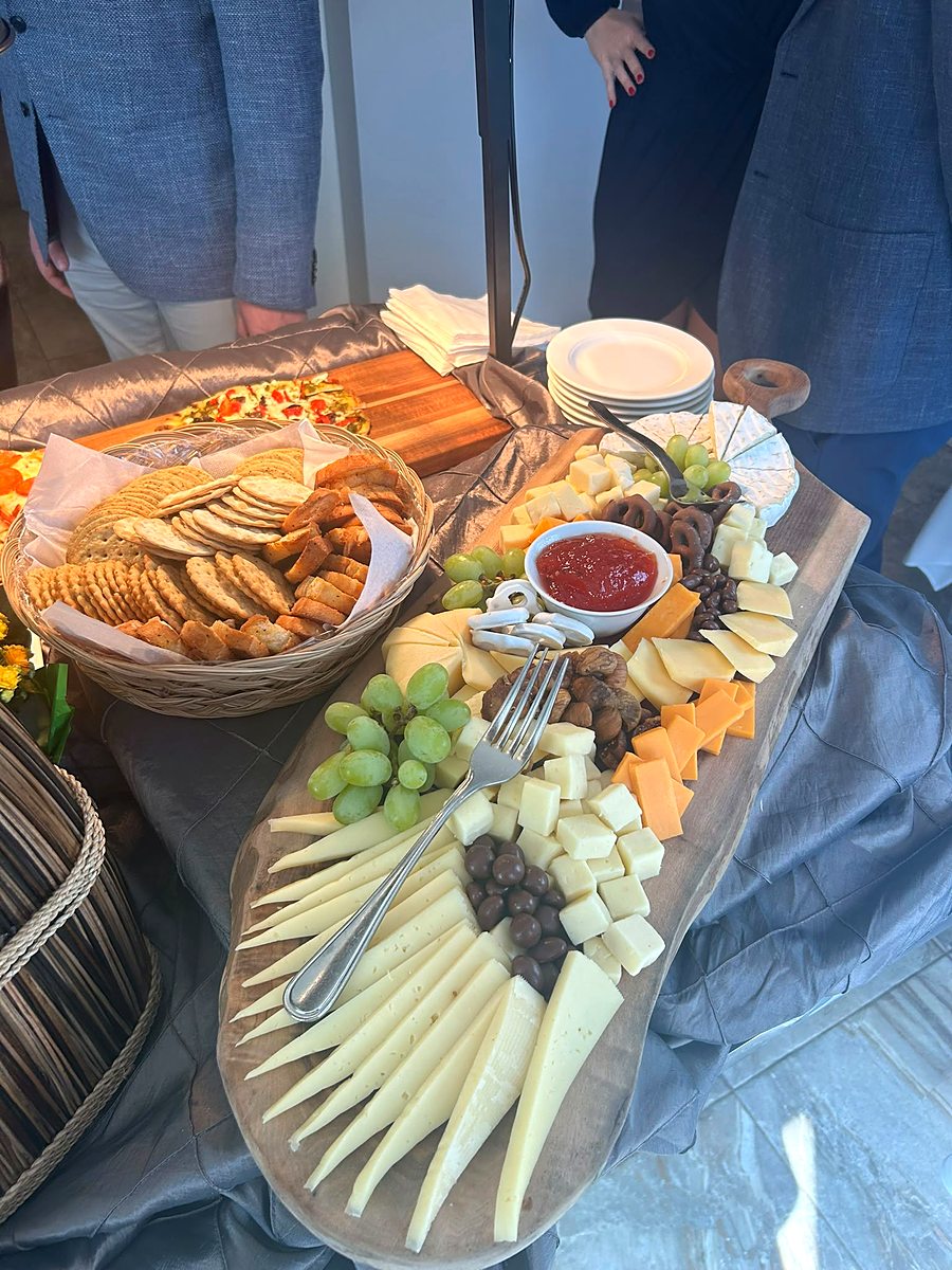 Abundant charcuterie and cheese board on live-edge wood