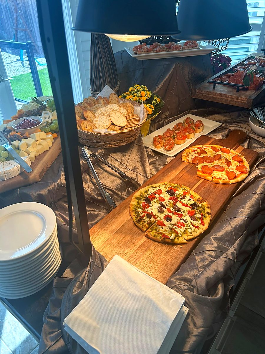 Grazing station with fresh-baked pizza and antipasto