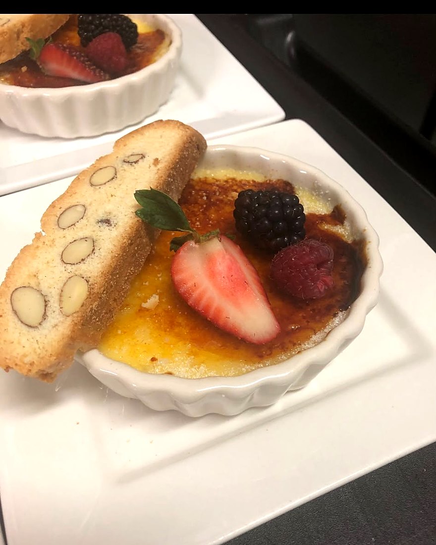Crème brûlée with fresh berries and biscotti, by CF Culinary Events