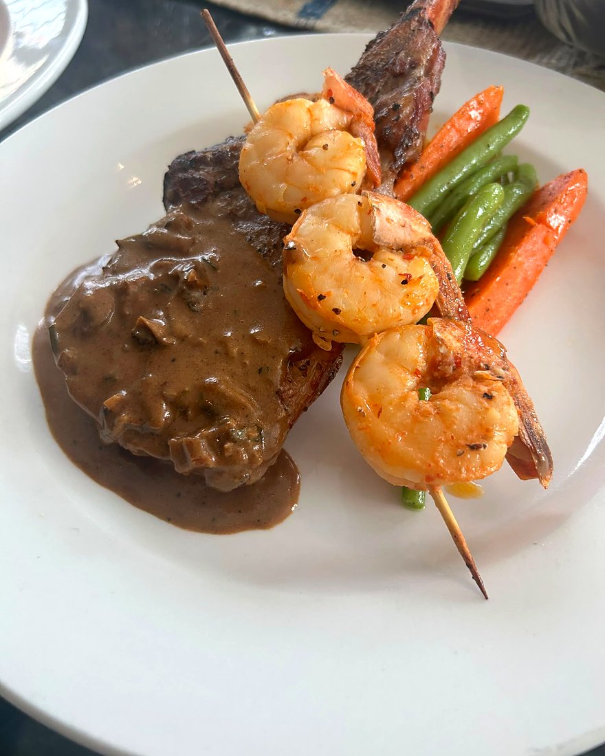 Duo plate of steak and shrimp skewer with vegetables, by CF Culinary Events