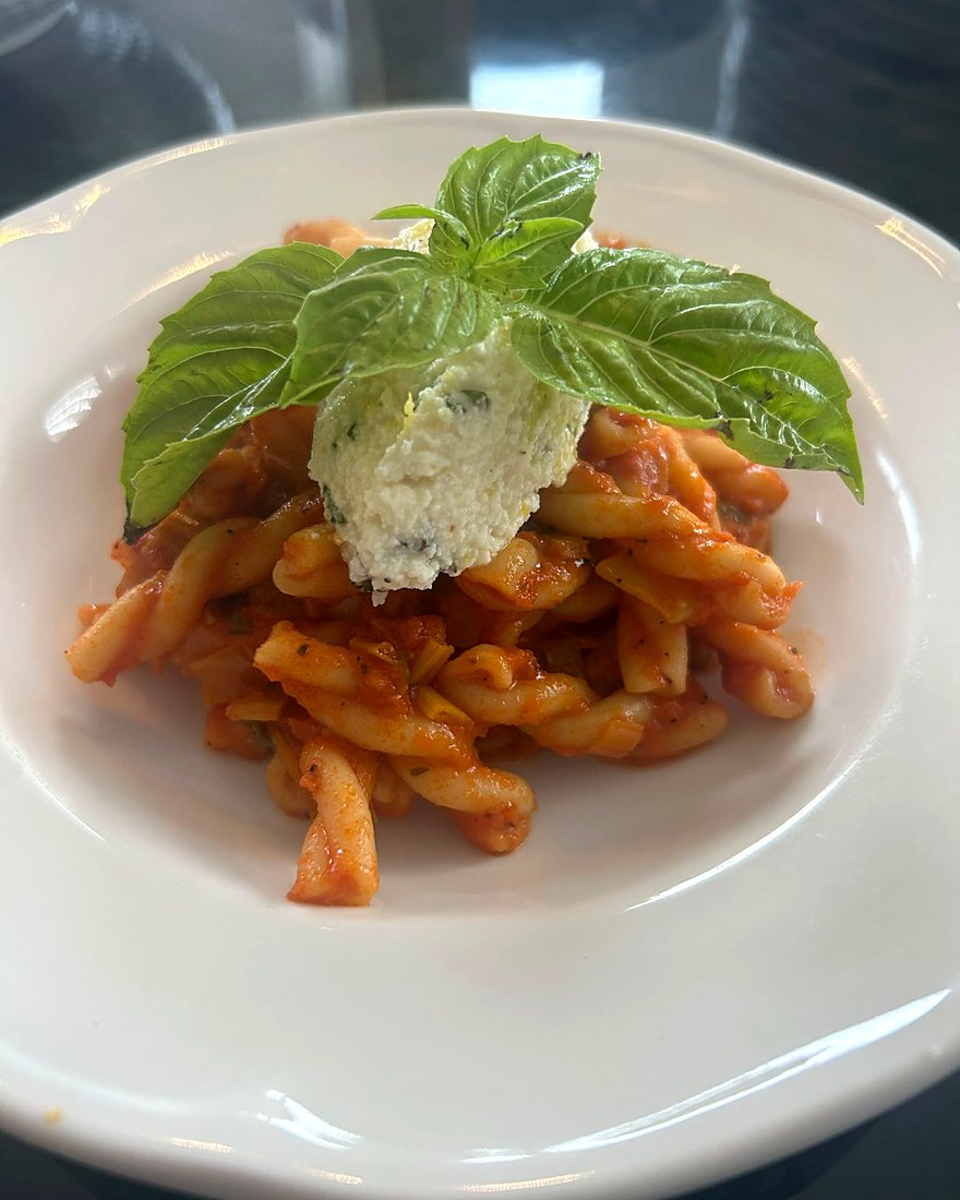 Pasta with burrata, cherry tomatoes and basil, plated by CF Culinary Events