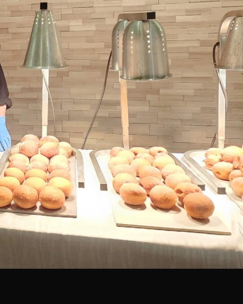 Malasadas being made at a CF Culinary Events live station